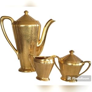 Gold Glazed Porcelain Coffee Pot and Cream and Sugar Set Signed "Obome"